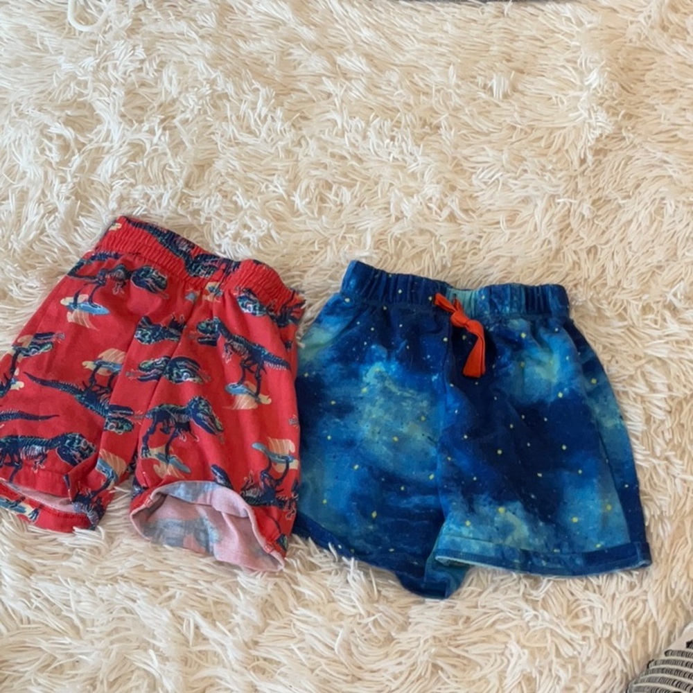 Boys pajama shorts Dino is size xs 4/5 and blue is xs 5/6